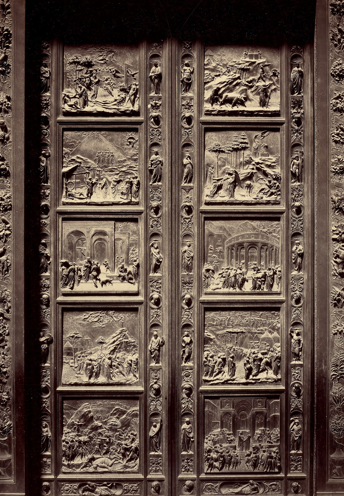Figures, heads and botanical frame detail from Ghiberti's Gates of Paradise